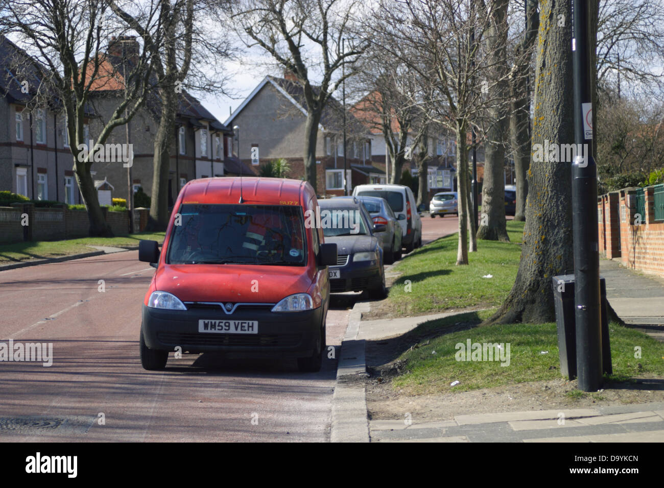 Royal mail, post office van parked at side of road, red post van. Grangetown, sunderland,tyne and wear england. Stock Photo