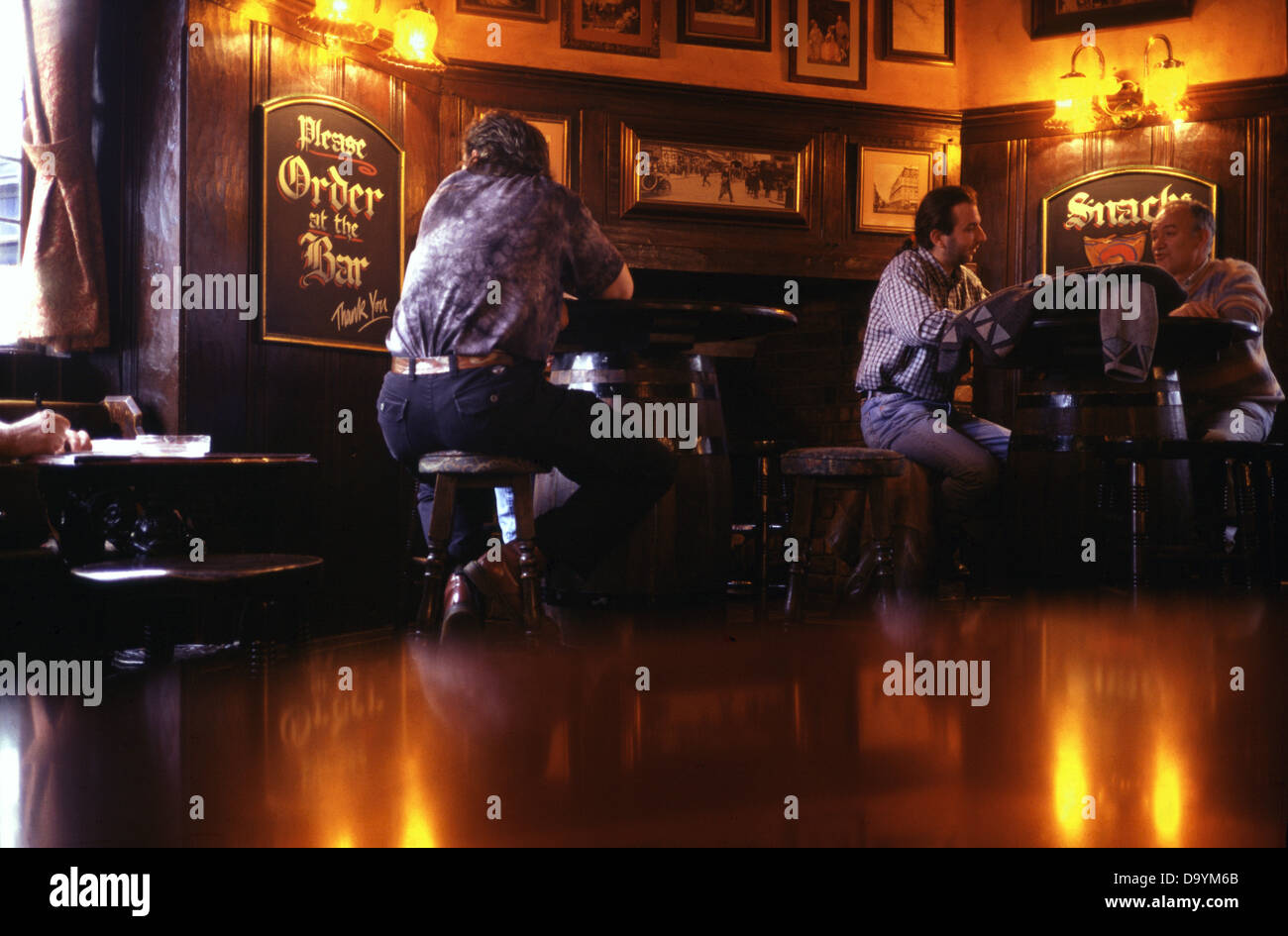 People sitting in a bar London UK Stock Photo