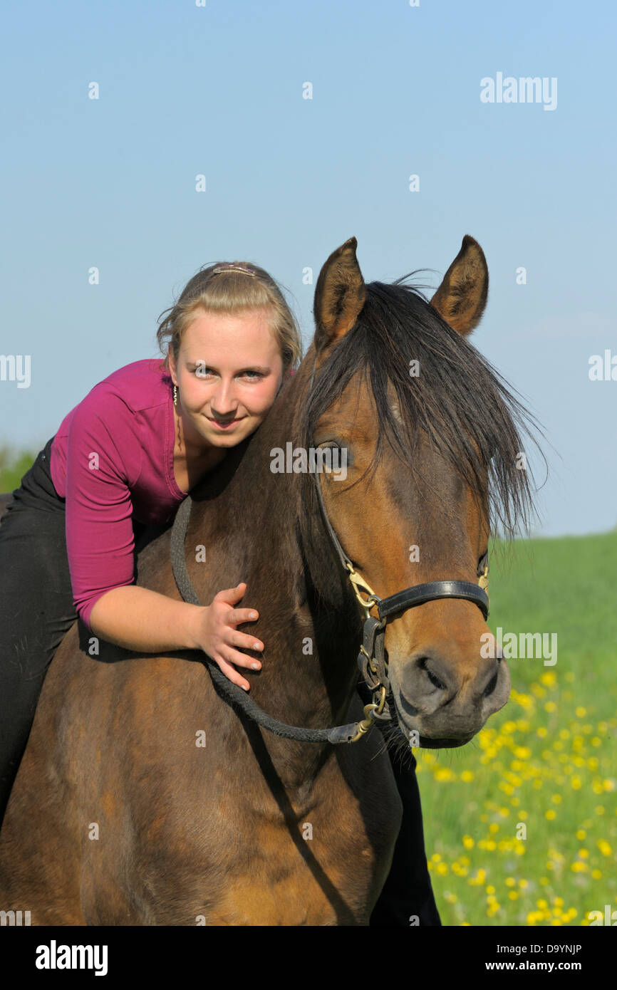 Teen and a Paso Fino horse Stock Photo