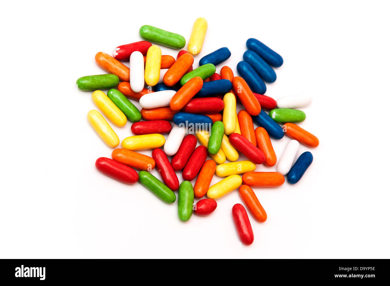 candy of many shapes and colors on white background Stock Photo - Alamy