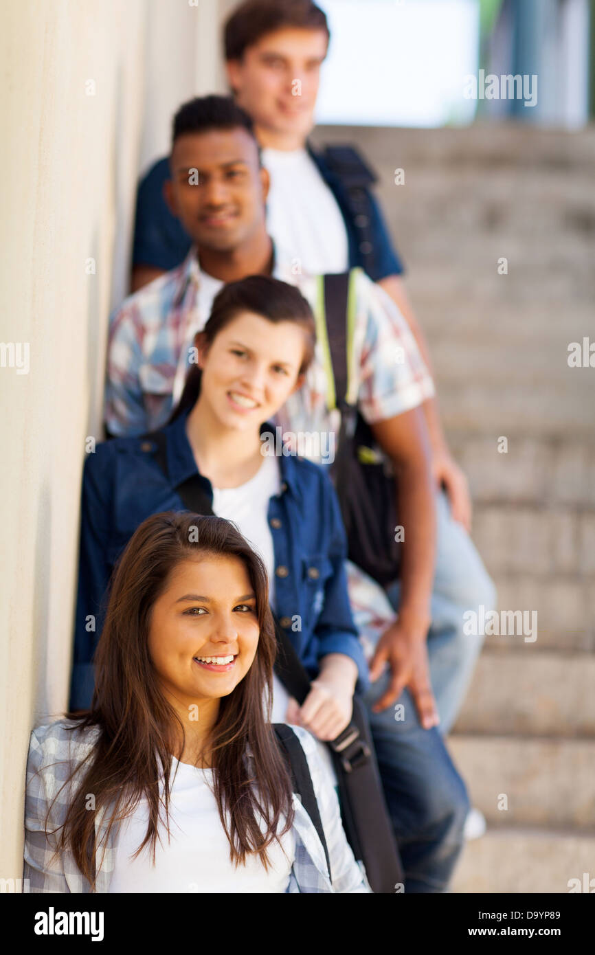 group of high school girls and boys standing by corridor Stock Photo