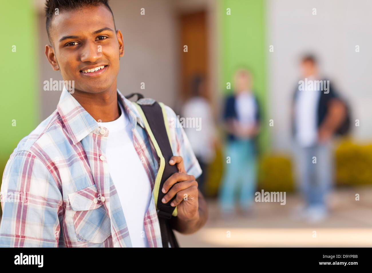 portrait of male Indian high school student with schoolbag Stock Photo