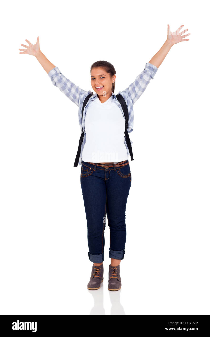 happy teenage girl with arms outstretched on white background Stock Photo