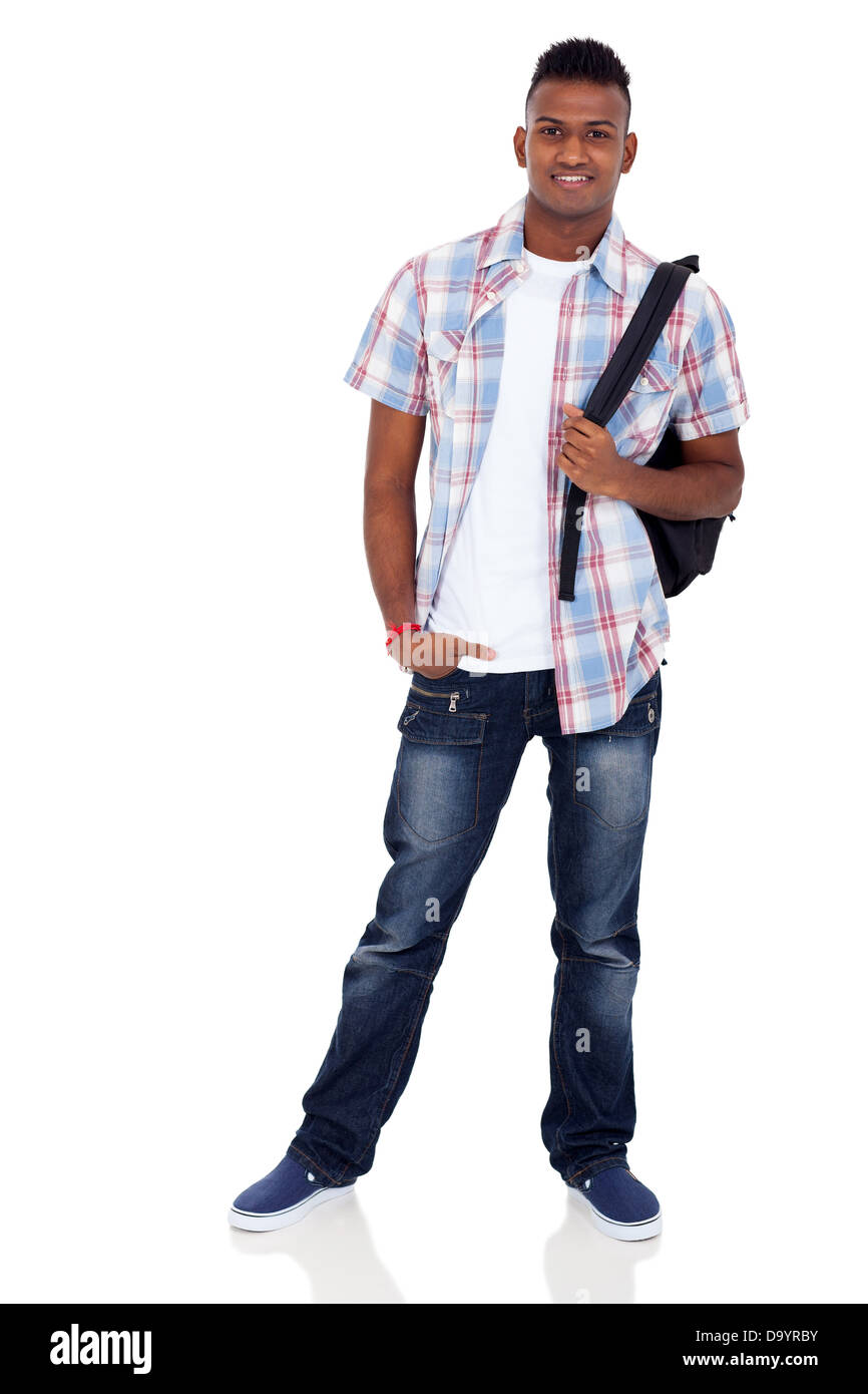 smiling Indian teenager boy with schoolbag standing on white background Stock Photo