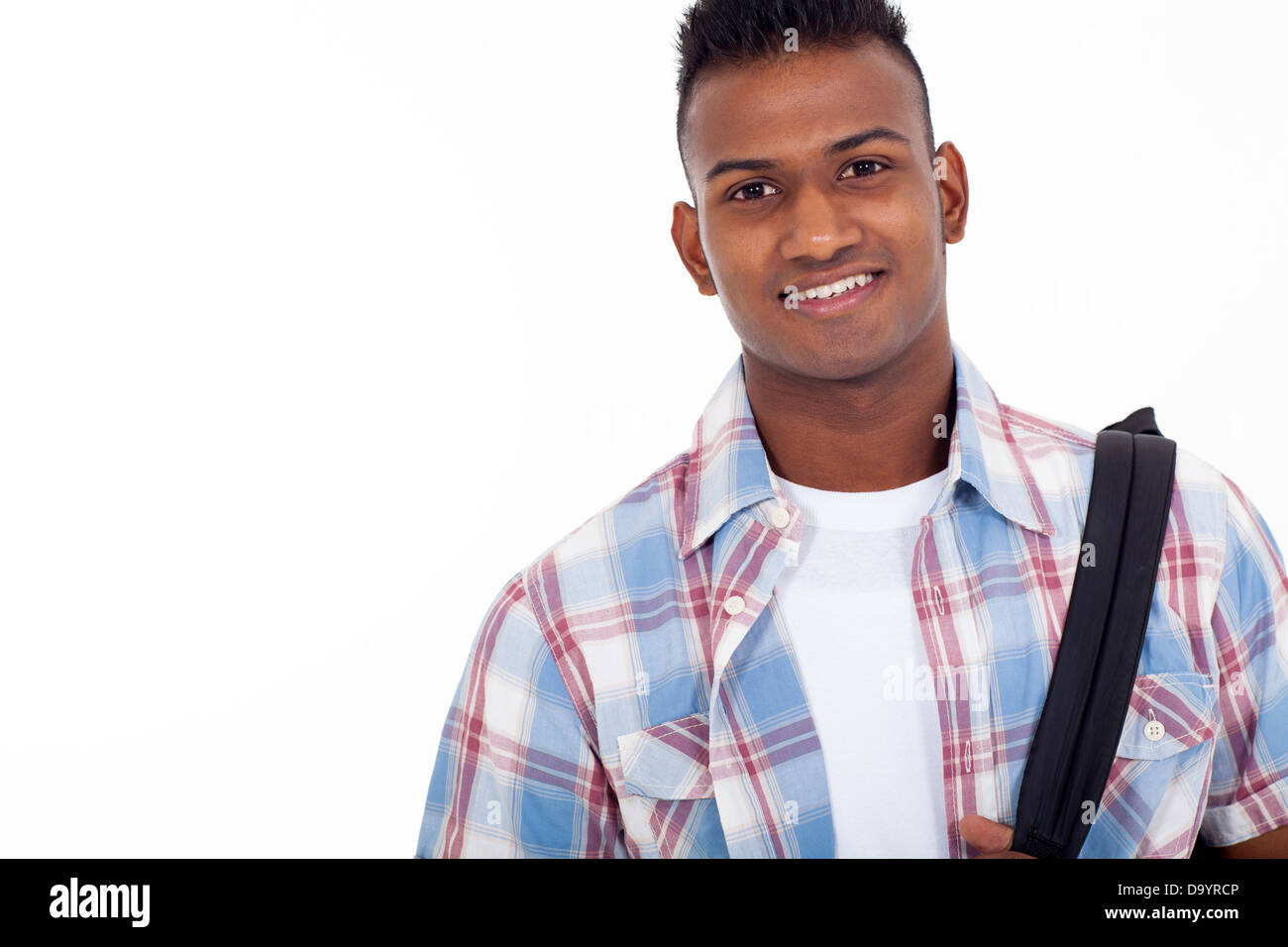 portrait of handsome Indian teenage high school student on white background Stock Photo