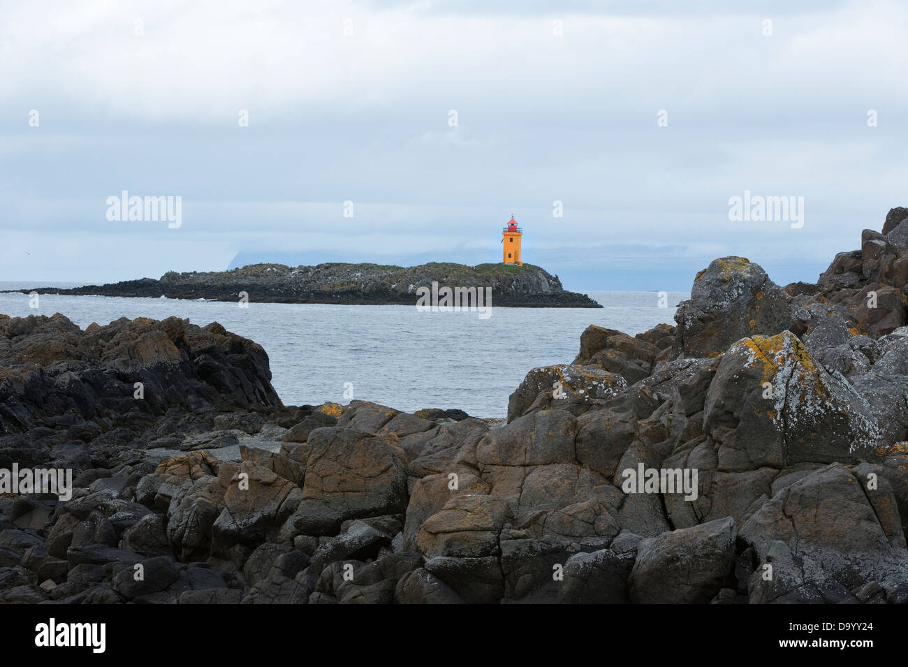 Lighthouse view from coast of Flatey Island to sea Iceland Europe Stock Photo