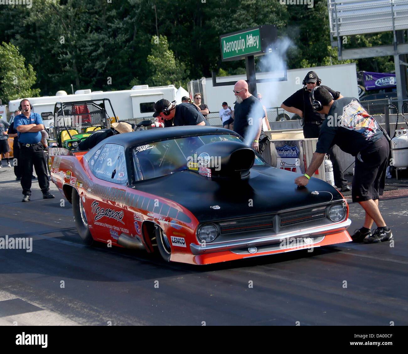 Martin, Michigan, USA. 28th June 2013. Raymond J. Matos 277(Pro Mod) purges the nitrous before