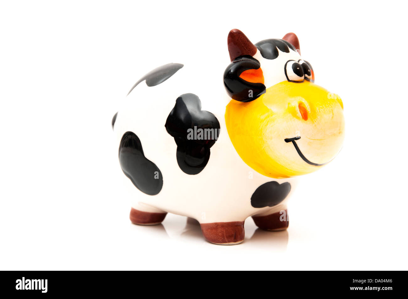 cow piggy bank on a white background Stock Photo