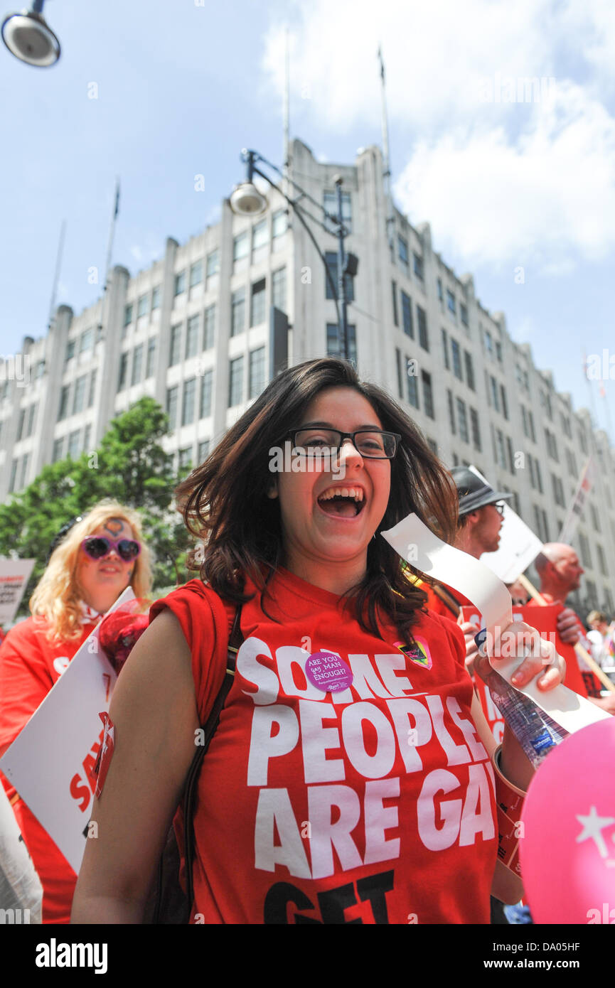 Oxford Circus, London, UK. 29th June 2013. Members of Stonewall wearing 'Some People are Gay, Get Over it' T-shirts in the London Pride Parade. Credit:  Matthew Chattle/Alamy Live News Stock Photo
