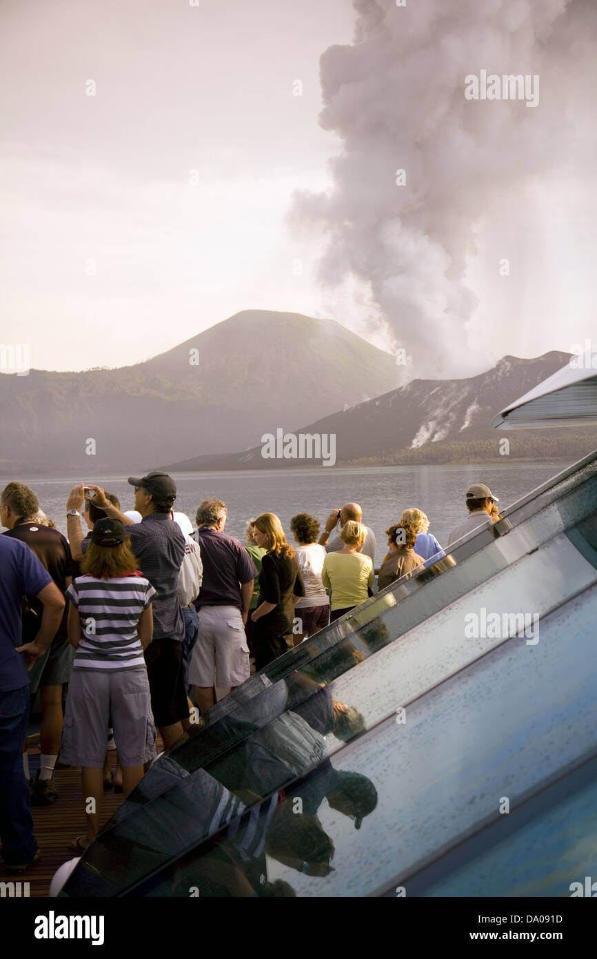 Volcanic Display Tourists observe a dramatic volcanic display put on by the ...