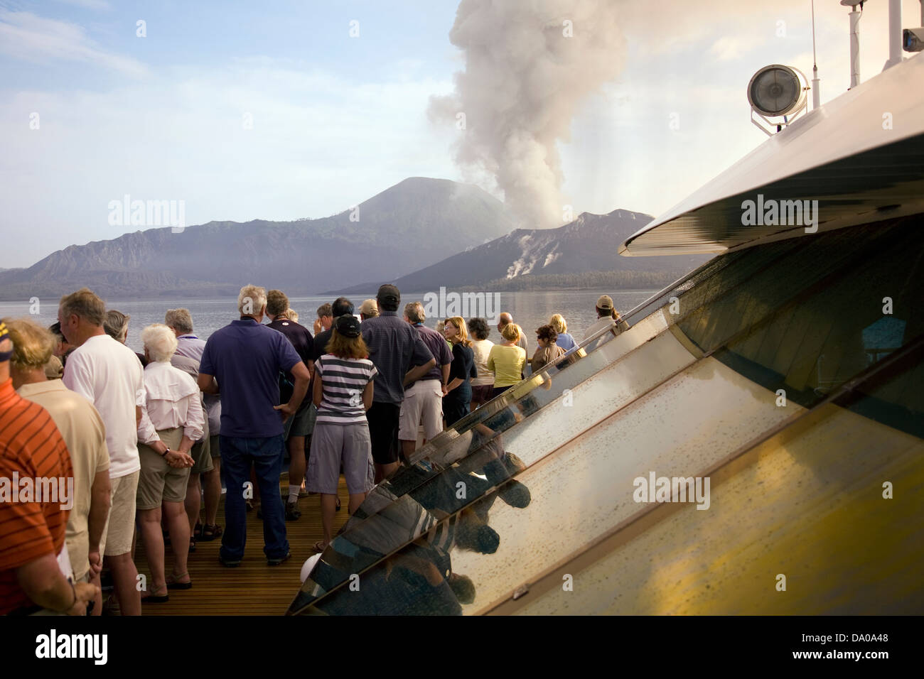 Volcanic Display Tourists observe a dramatic volcanic display put on by the ...