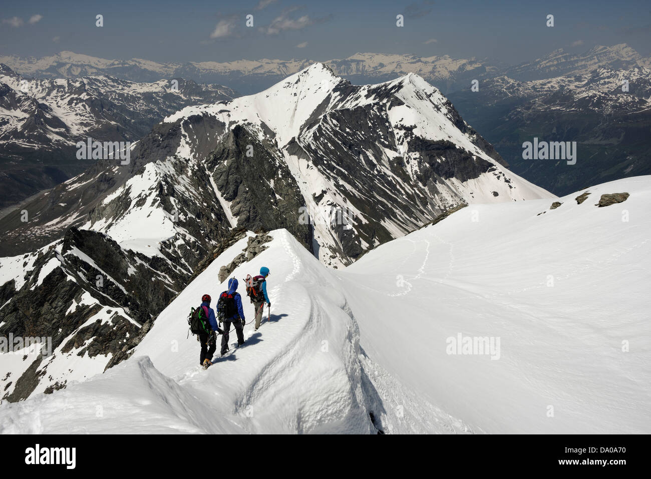 Alpine climbers descending the Pigne de la Le Stock Photo