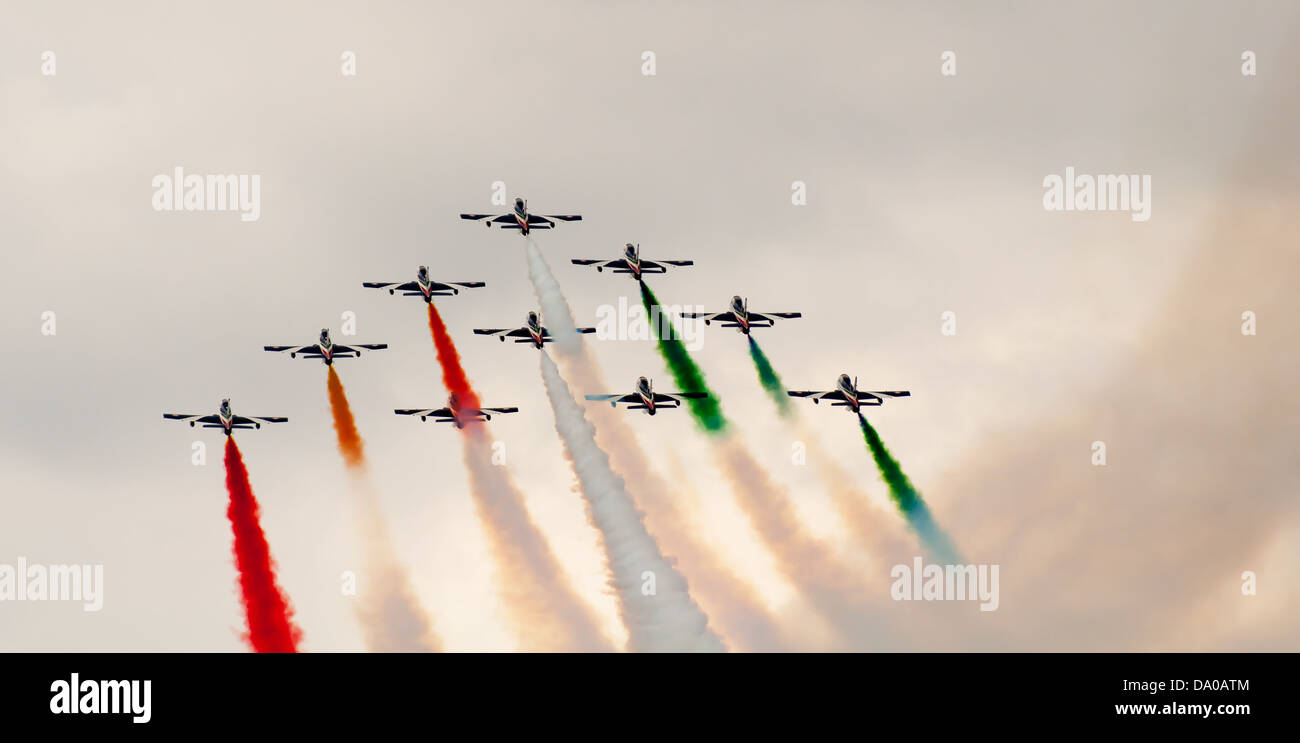 italian aerobatics team in formation deploying smoke Stock Photo