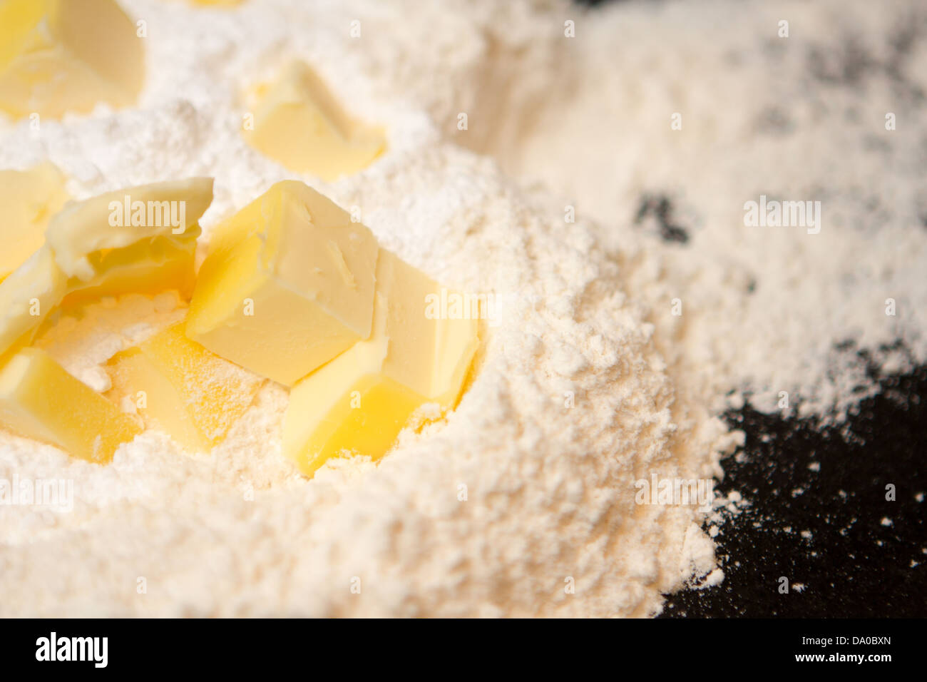 Detail of flour, butter and icing sugar ready for making a pastry Stock Photo