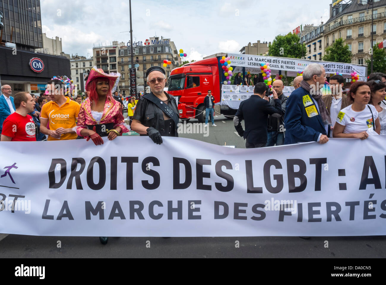 Paris, France, Large Crowd people, front, LGBT Groups Marching in Annual Gay Pride, Front Holding protesters banner, gay rights struggle, people  street gay rights march, equal rights signs Stock Photo