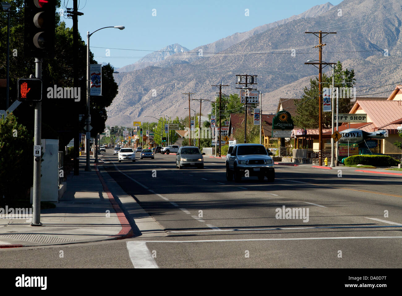 Cars on Highway 395 driving through the town of California Stock