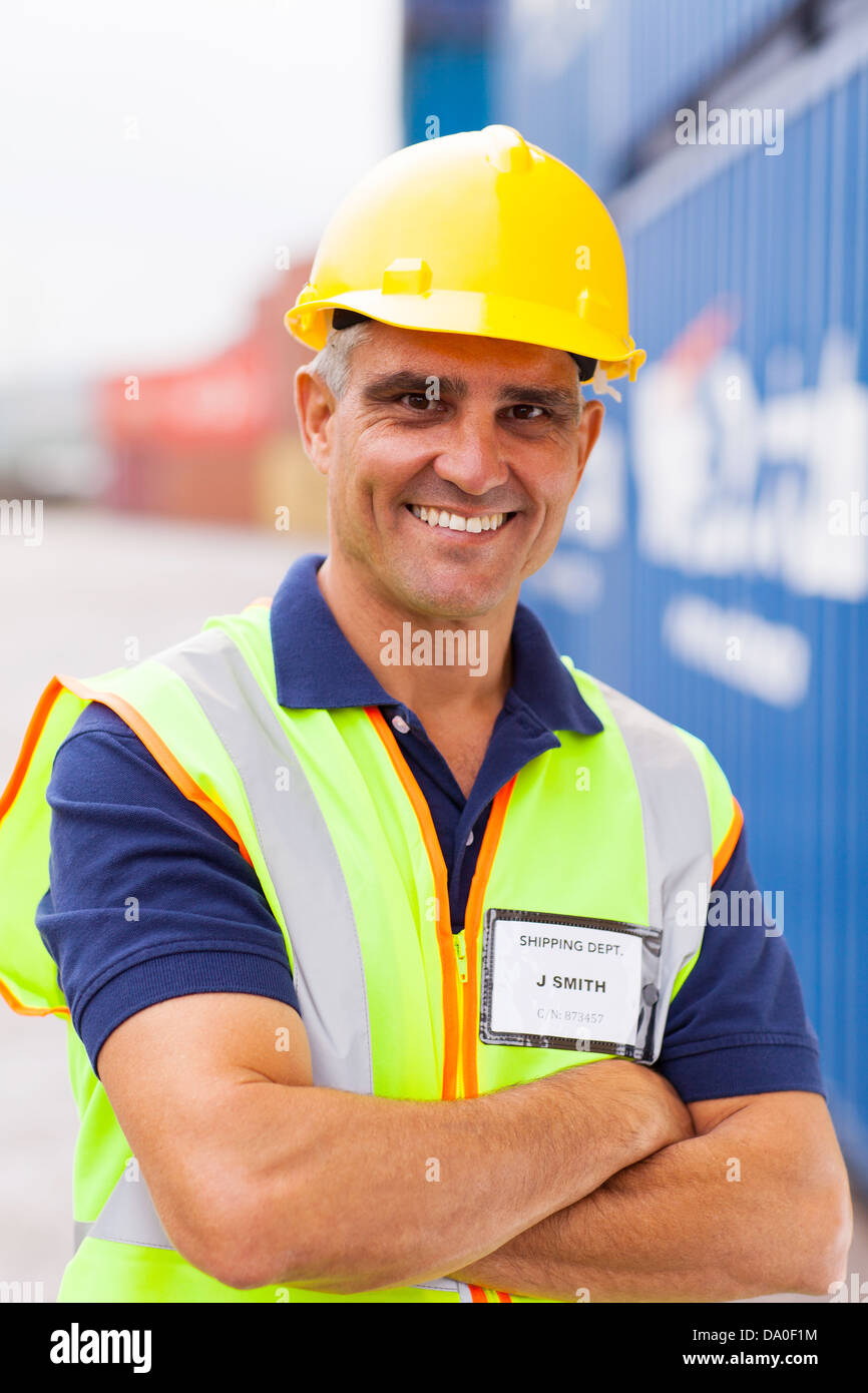 senior container shipping company worker in depot Stock Photo