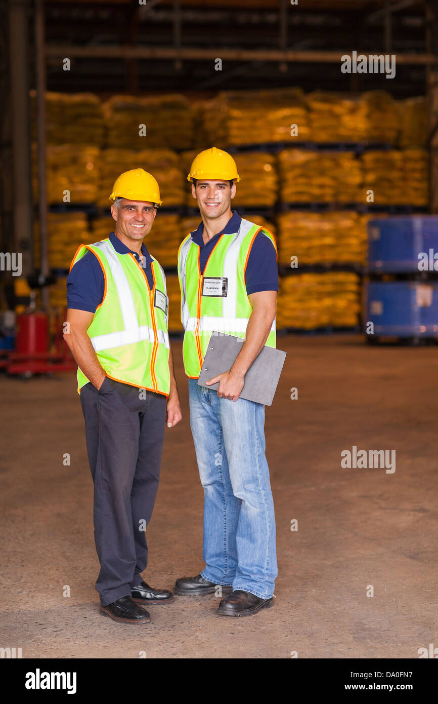 two shipping and warehouse worker portrait in workplace Stock Photo
