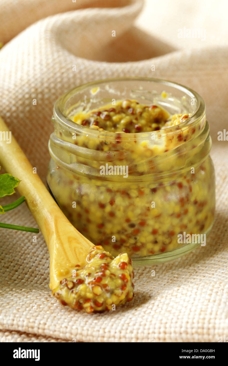 Traditional dijon mustard in a glass jar Stock Photo Alamy