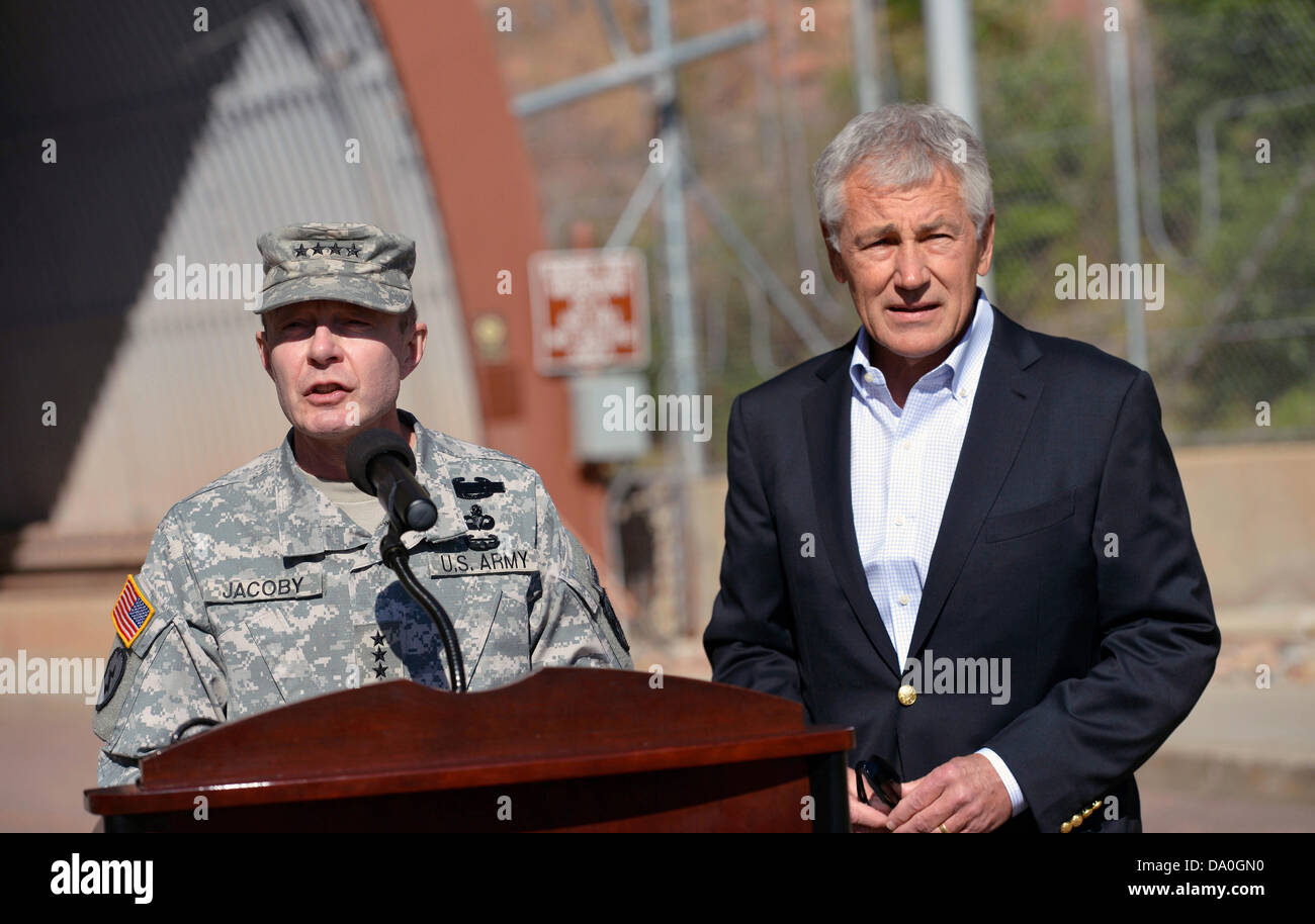 US Secretary of Defense Chuck Hagel and NORTHCOM commander Gen. Chuck Jacoby speak to the media outside the entrance of Cheyenne Mountain Air Force Station as he visits USNORTHCOM June 28, 2013 in Colorado Springs, CO. Stock Photo