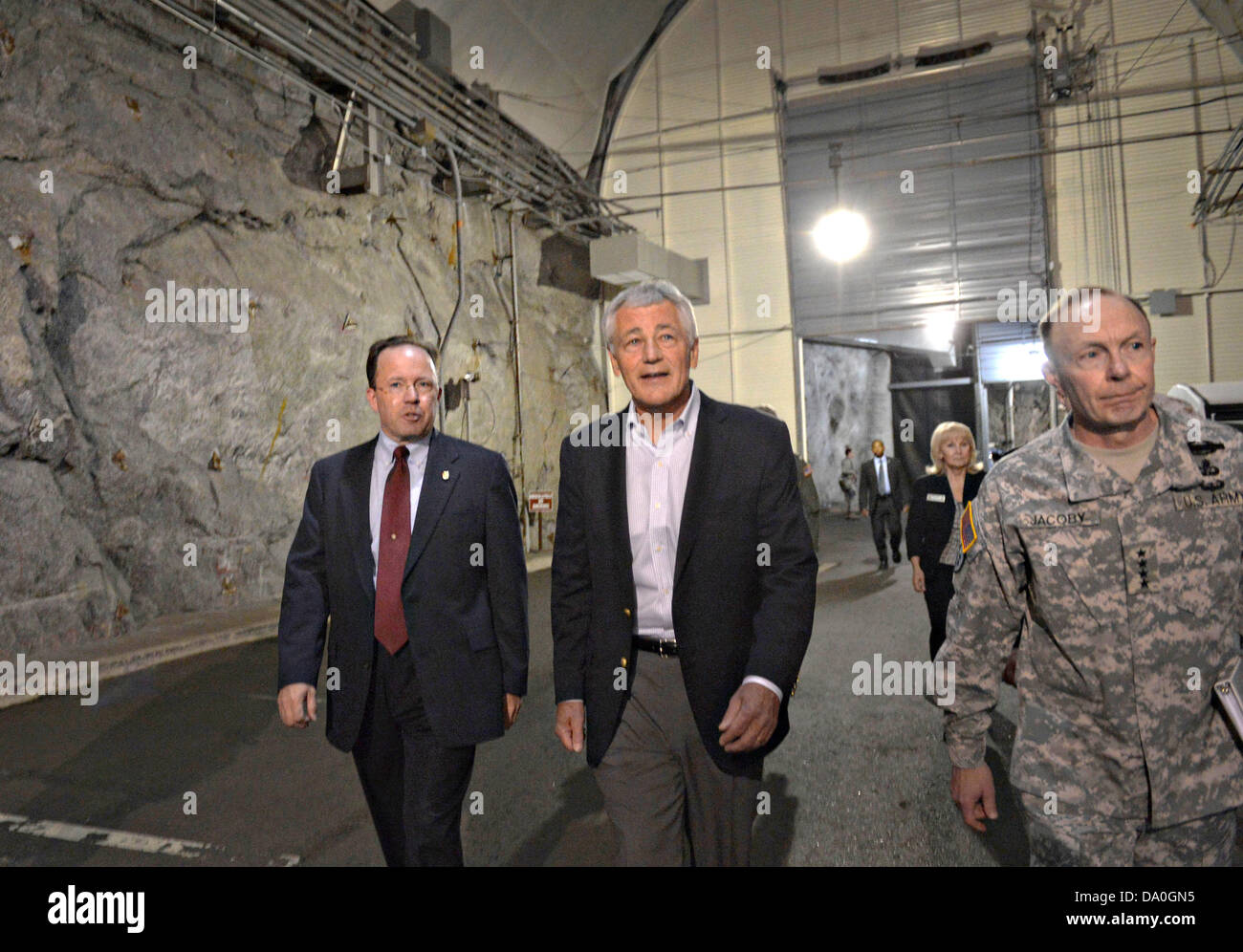 US Secretary of Defense Chuck Hagel is given a tour of the underground tunnels of Cheyenne Mountain Air Force Station by Steve Rose, left, and NORTHCOM commander Gen. Chuck Jacoby during a visit to USNORTHCOM June 28, 2013 in Colorado Springs, CO. Stock Photo