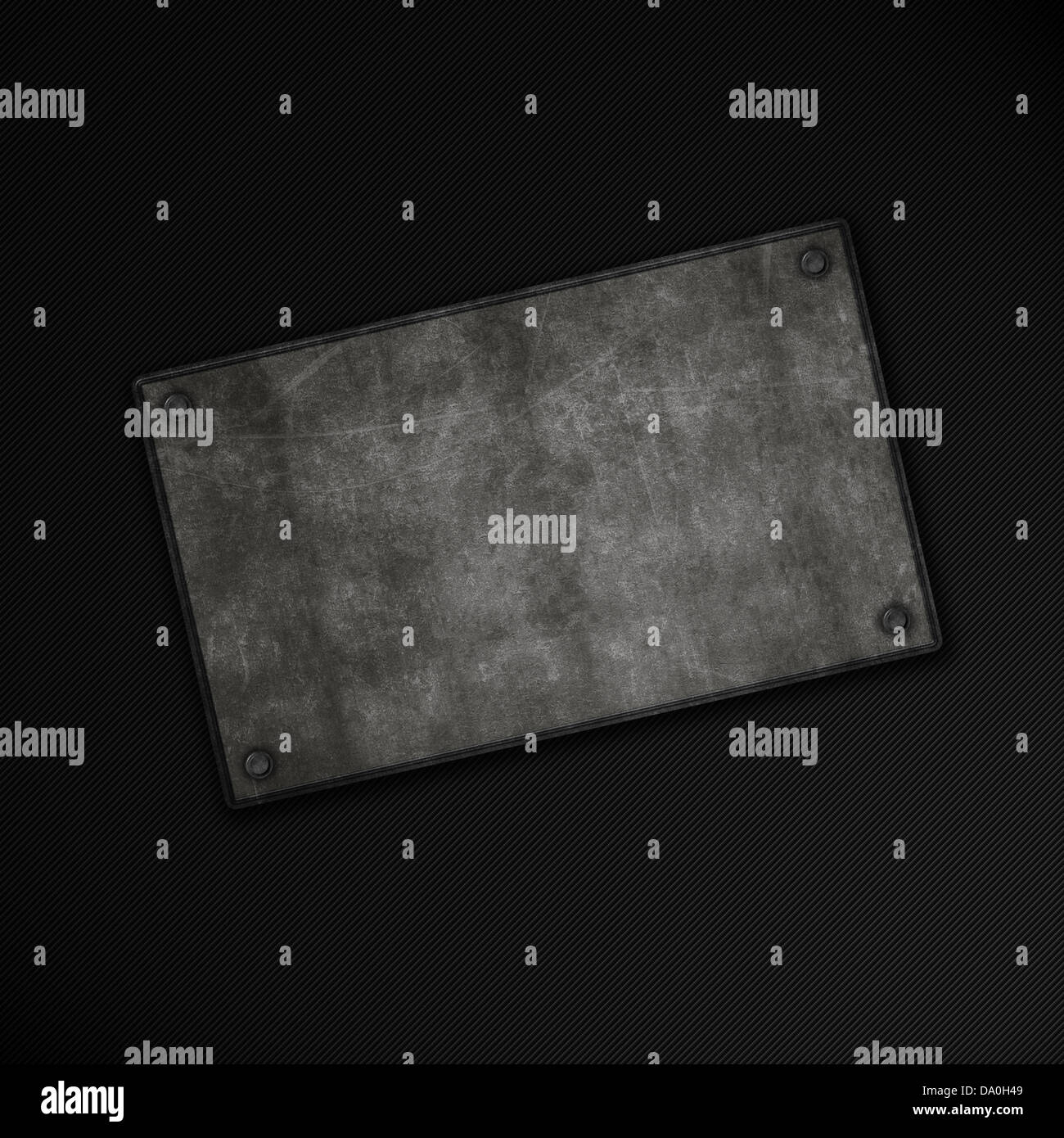 Grunge metal plate on a carbon fibre background Stock Photo - Alamy