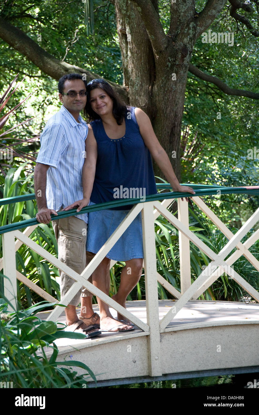 Couple on a bridge Stock Photo - Alamy
