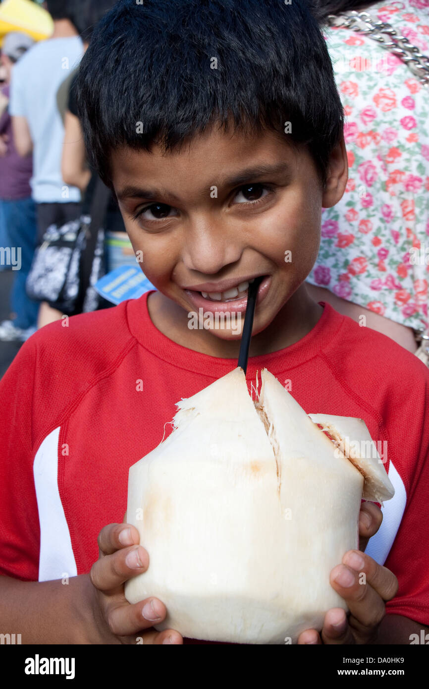 Boy drinking coconut water Stock Photo Alamy