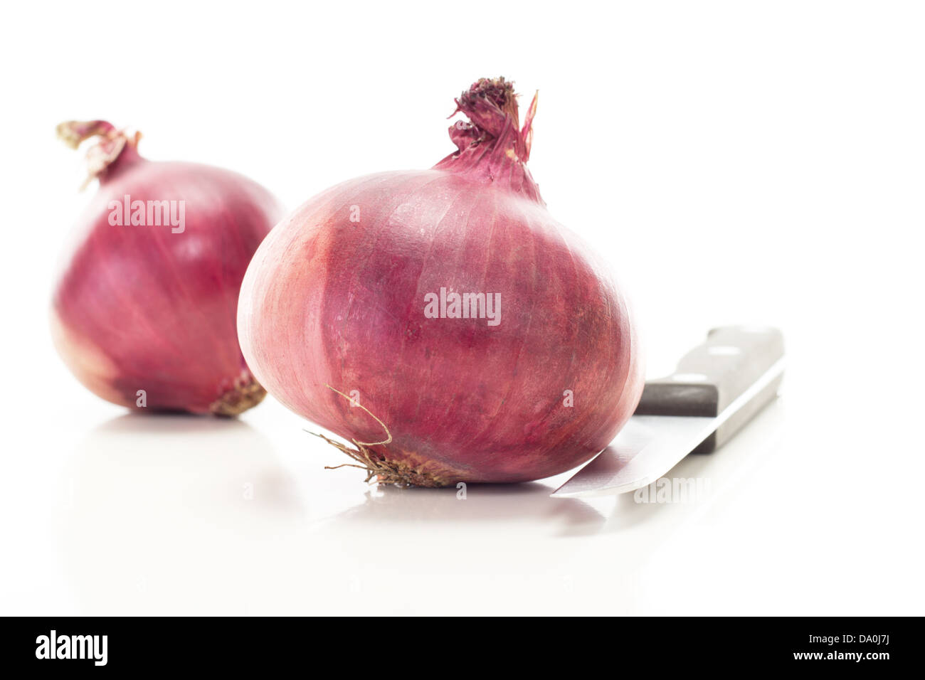 Cutting red onions for delicious salad Stock Photo Alamy