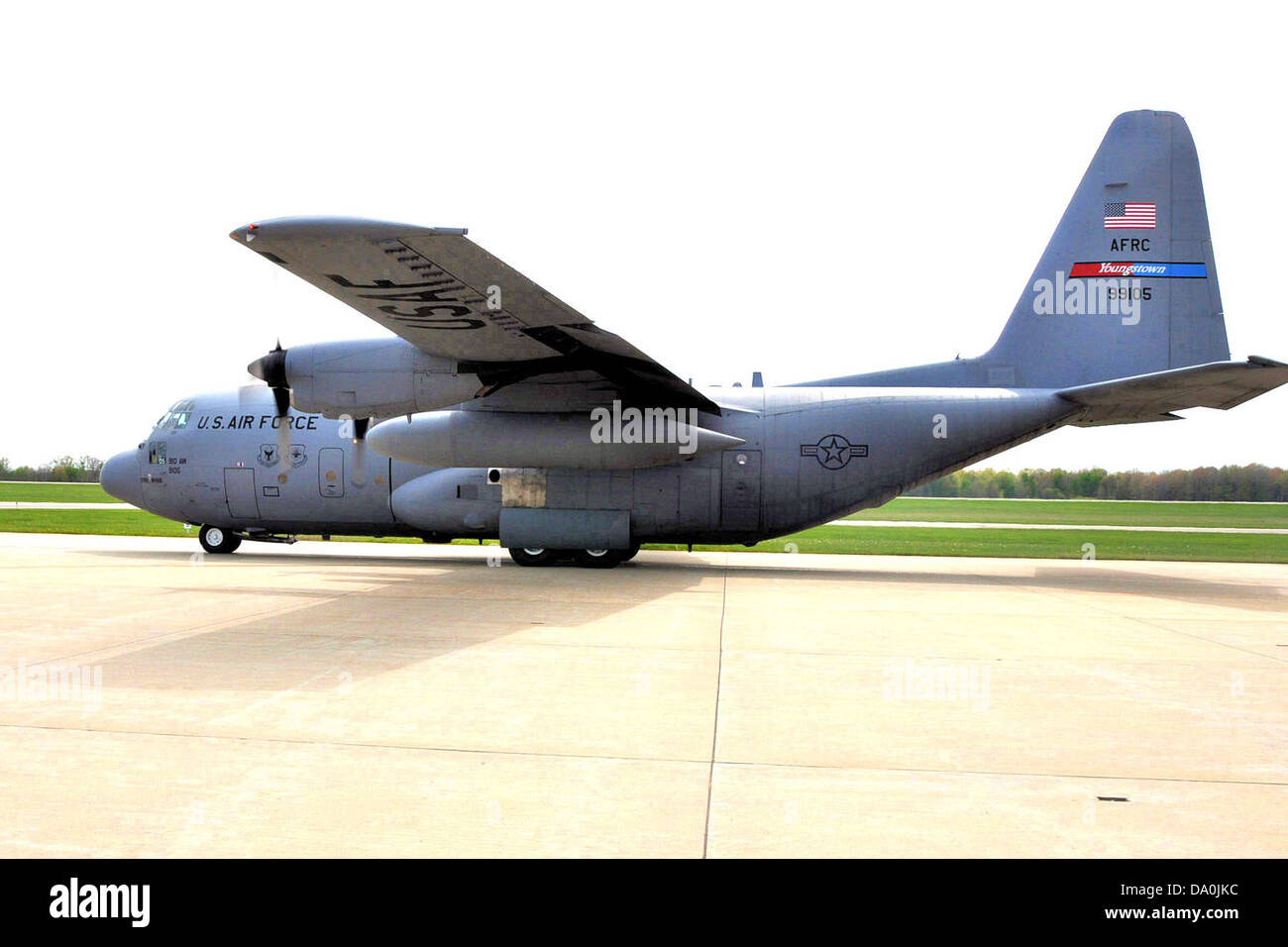 The Lockheed C-130H Hercules, tail number 89-9105, is operated by the 910th Airlift Wing. This military transport aircraft is utilized for troop transport, cargo airlift, and humanitarian missions, providing essential support in various operations. Stock Photo