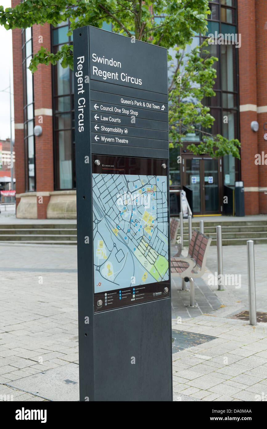 Street furniture in Regent Circus, Swindon, Wiltshire giving directions and showing a town plan Stock Photo