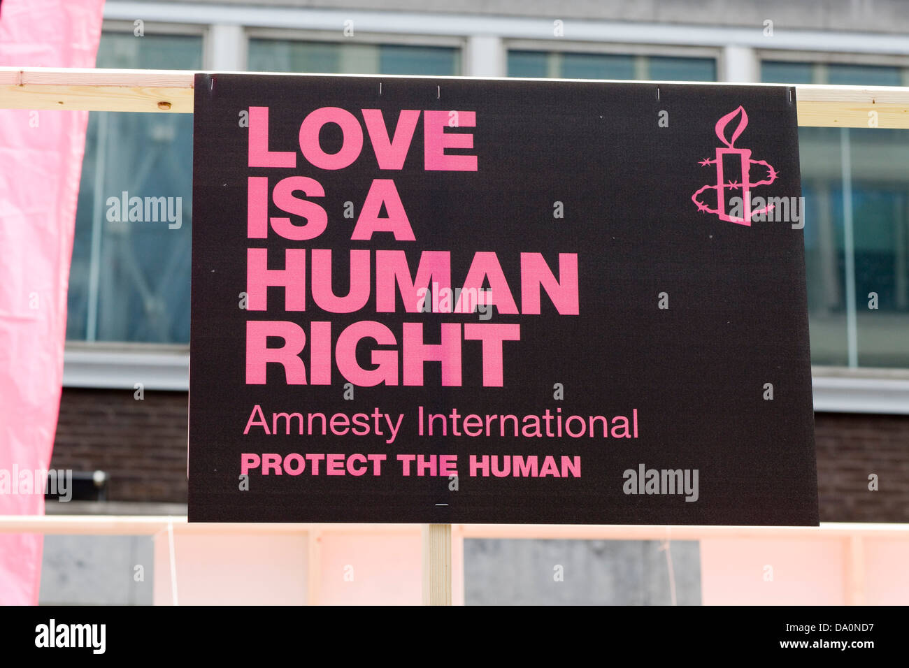 Information Signs 'Love is a Human Right' Amnesty international Protect the Human Stock Photo
