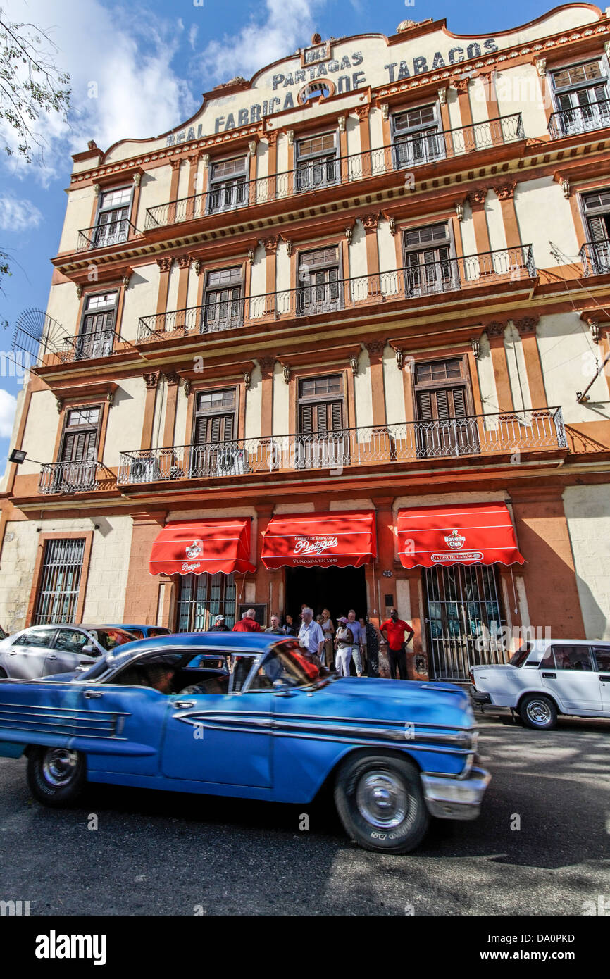 Oldtimer in front of tobacco factory in Havanna, Cuba Stock Photo
