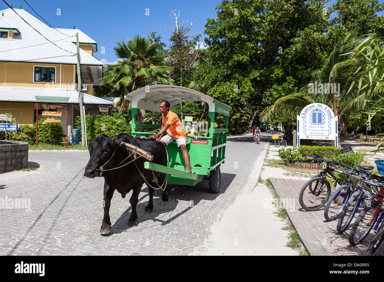 Oxcart taxi on the main street of La Passe ,La Digue, Seychelles, Indian Ocean, Africa Stock Photo