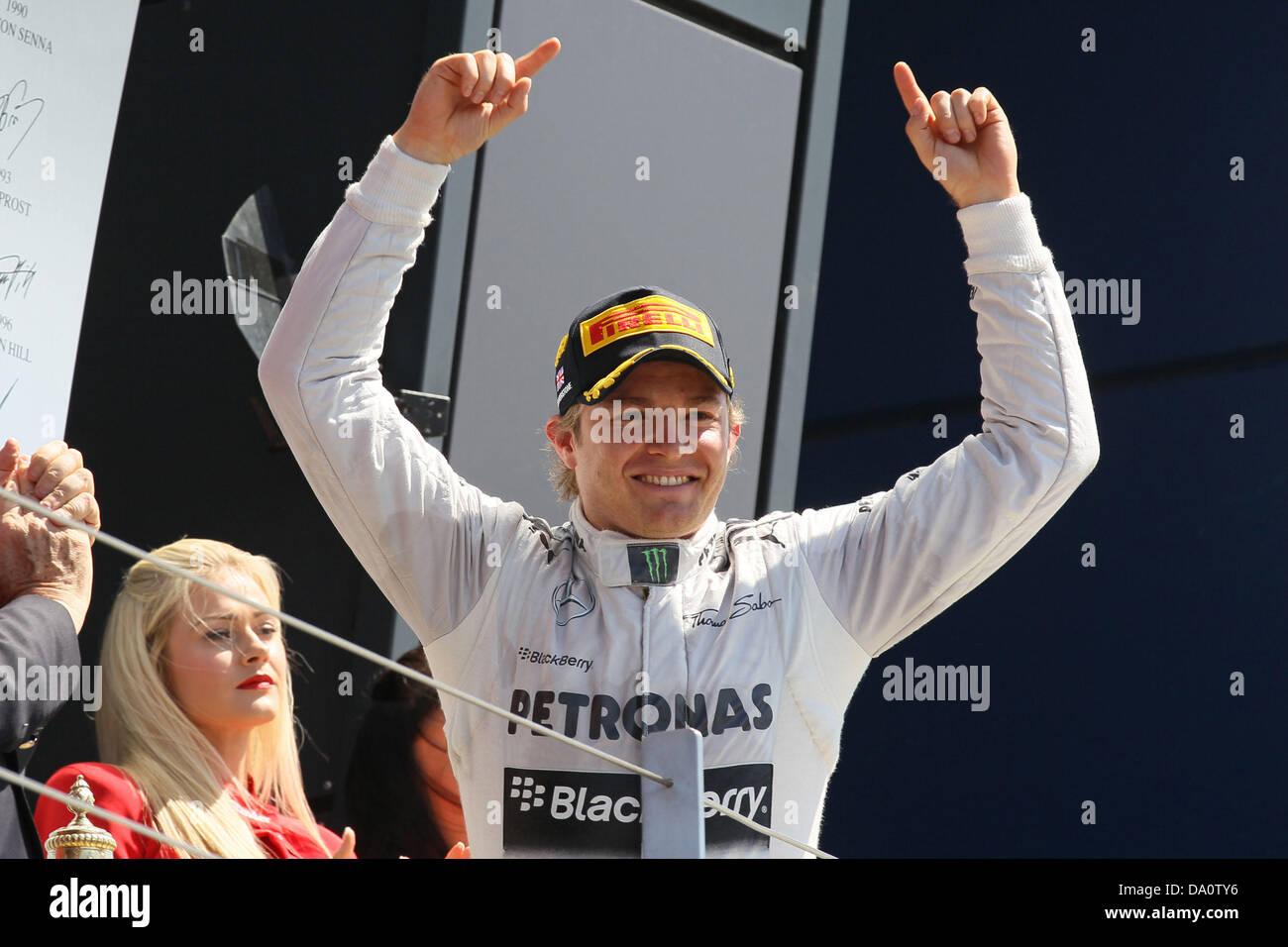 Silverstone, UK. 30th June, 2013. Silverstone Circuit, England. Nico Rosberg celebrates his win at the British GP Stock Photo