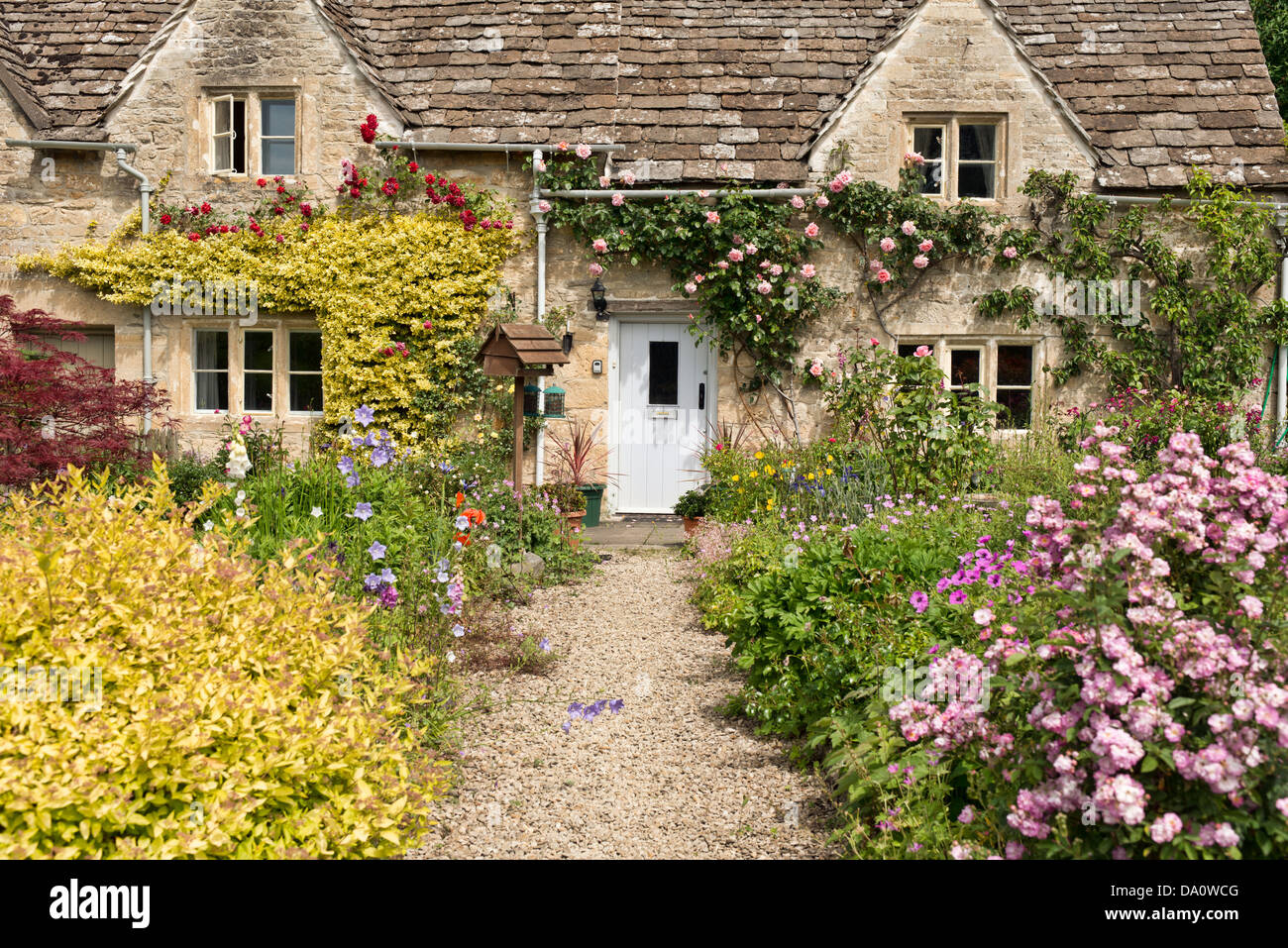 A pretty cottage & garden in Bibury, Gloucestershire, UK Stock Photo