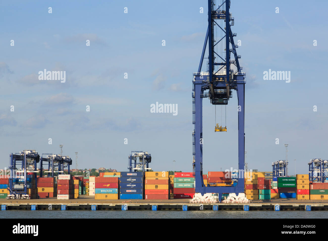 Gantry cranes for lifting containers on dockside terminal quay of largest British container port in UK. Felixstowe Port Suffolk England Britain Stock Photo