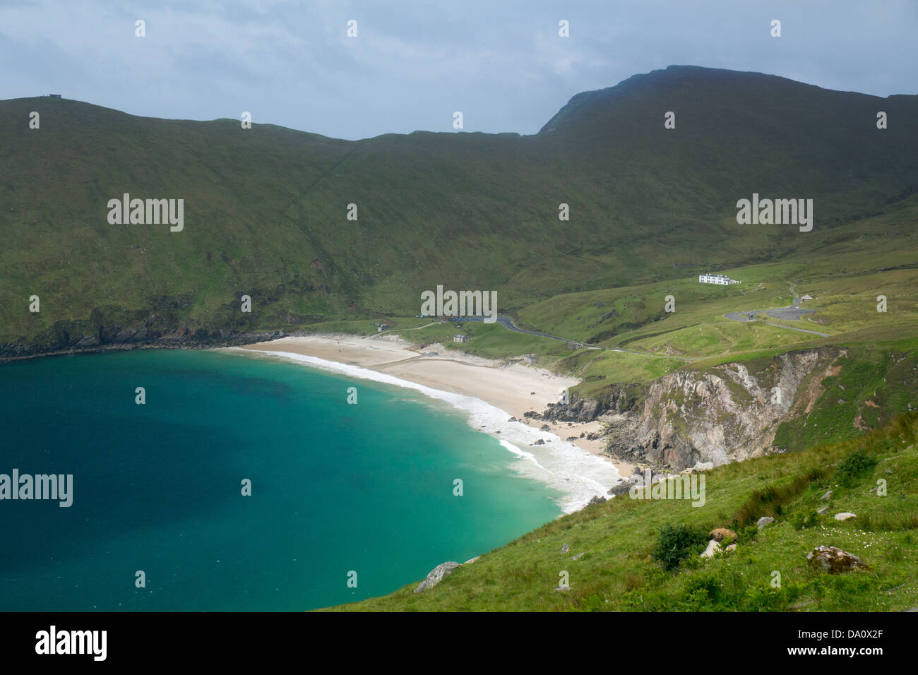 Keem Bay beach with dark sky and bright sunshine Achill Island County Mayo Eire Republic of Ireland Stock Photo