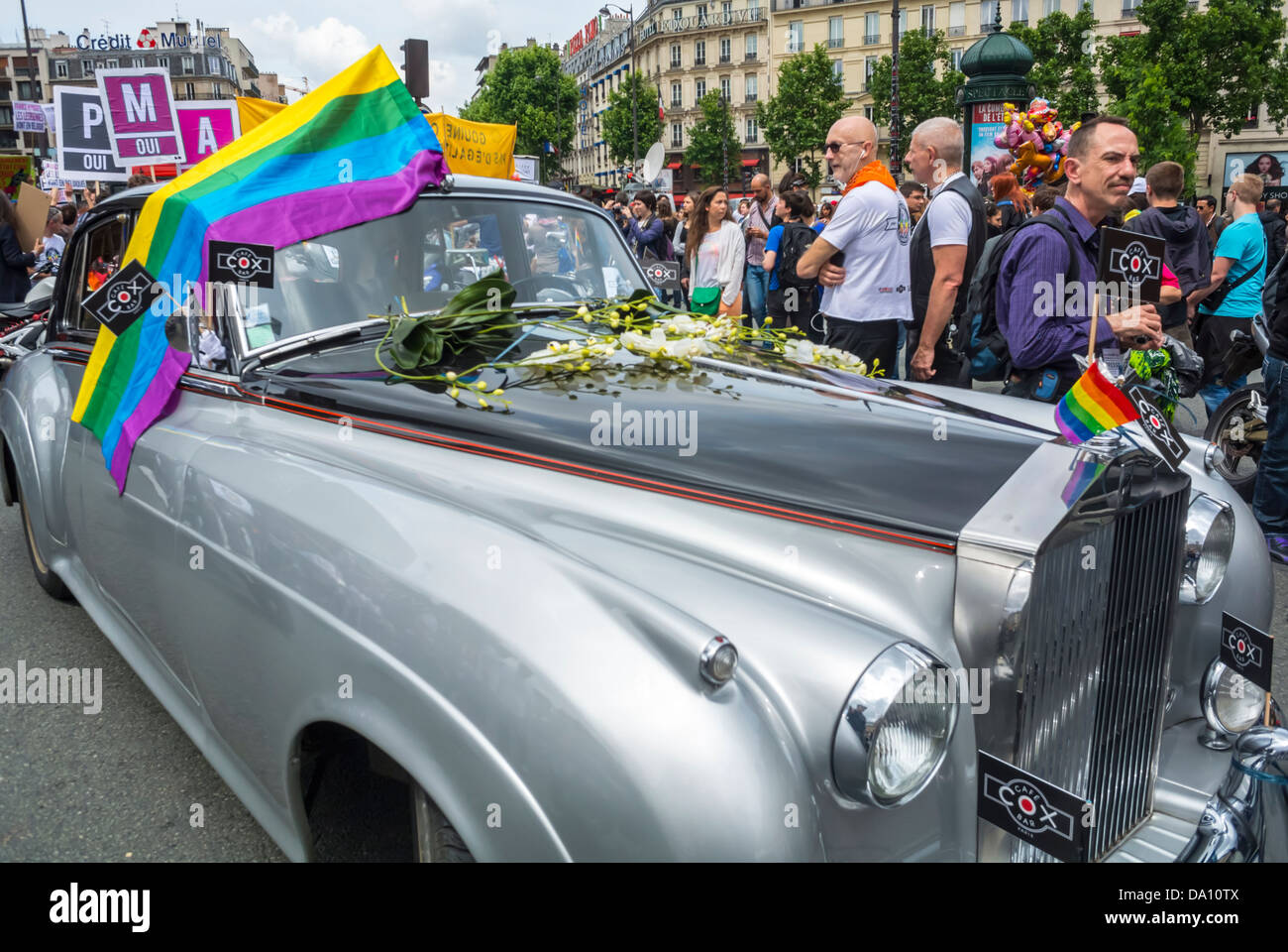 Paris, France, Rolls Royce Car, Gay Marriage, LGBT Groups in Annual Gay Pride Parade, Rainbow Flag, Side View on Street Stock Photo