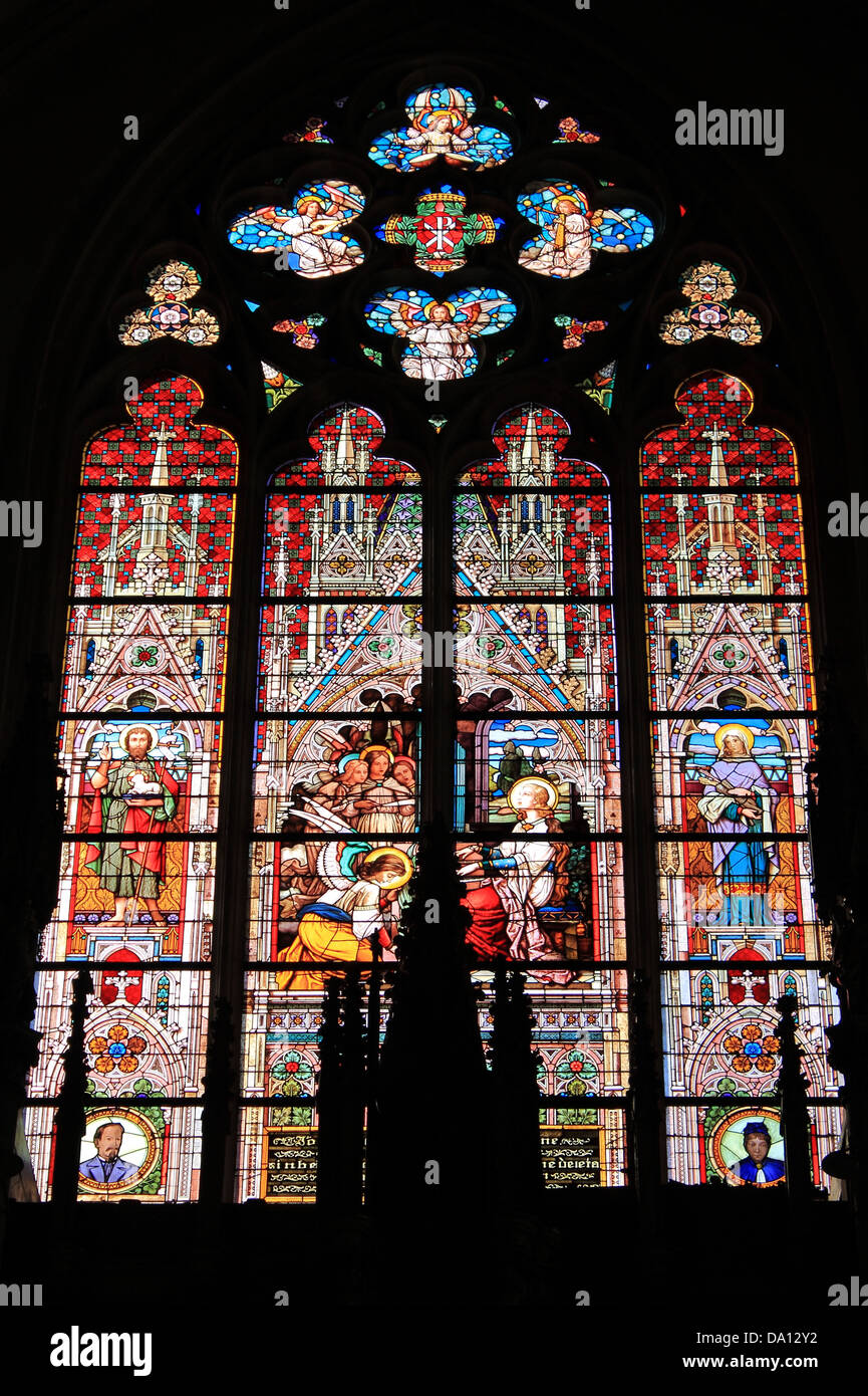 Stained glass window with catholic scenes Stock Photo