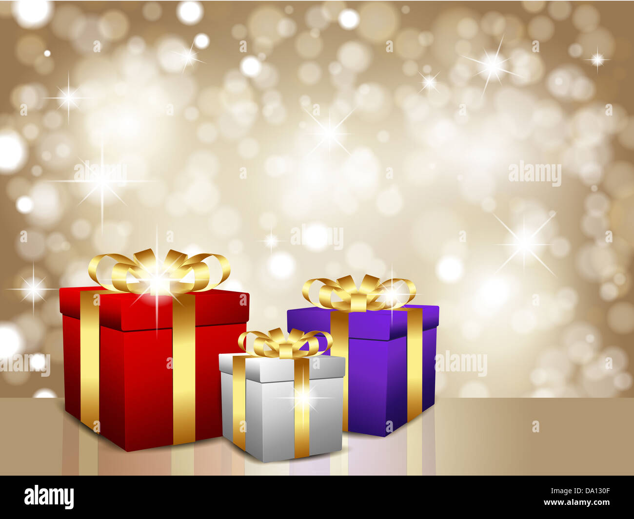 Christmas gifts on a glittery gold background Stock Photo - Alamy