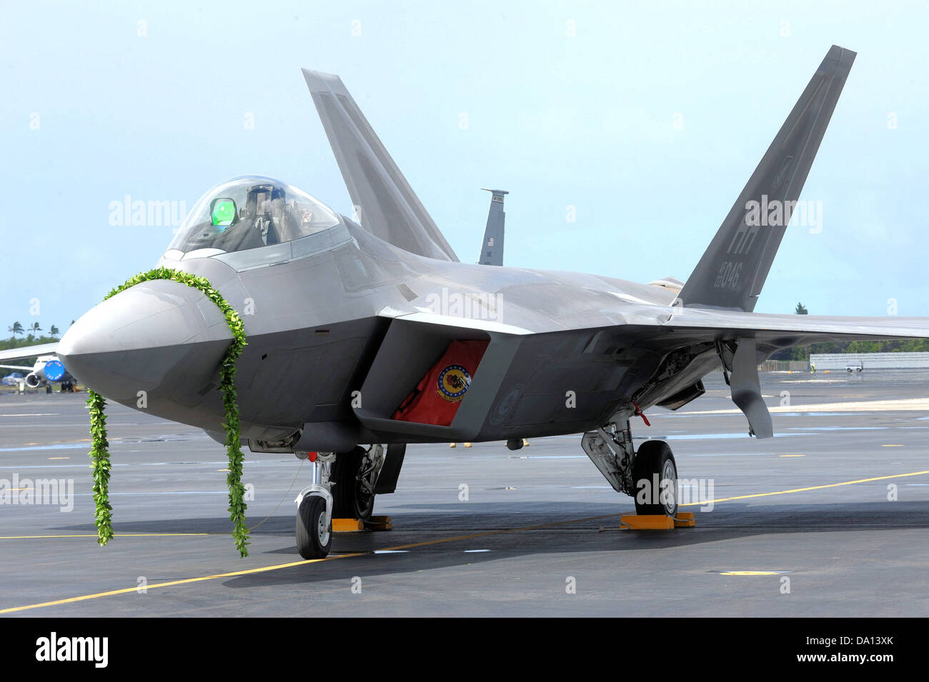 The F-22 Raptor, stationed at Hickam Air Force Base in Hawaii, is a fifth-generation fighter aircraft known for its stealth, advanced avionics, and superior air combat capabilities. It is used by the U.S. Air Force for air superiority and precision strikes. Stock Photo