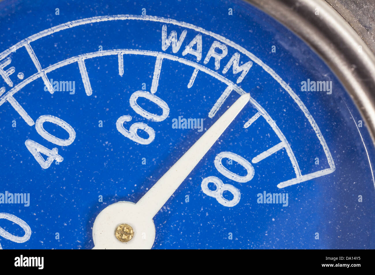 Vintage blue refrigerator thermometer macro warm zone detail. Stock Photo