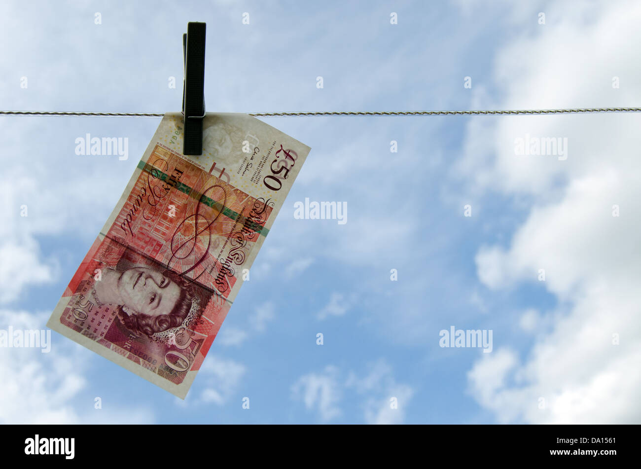 Washing Line Notes Fifty Pound Notes hanging on a washing line Stock Photo - Alamy