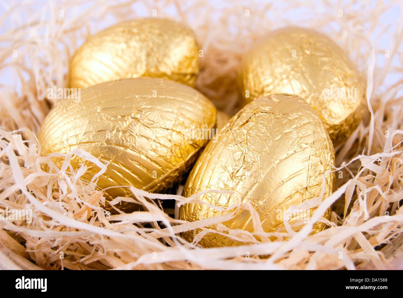 Golden foil eggs hi-res stock photography and images - Alamy