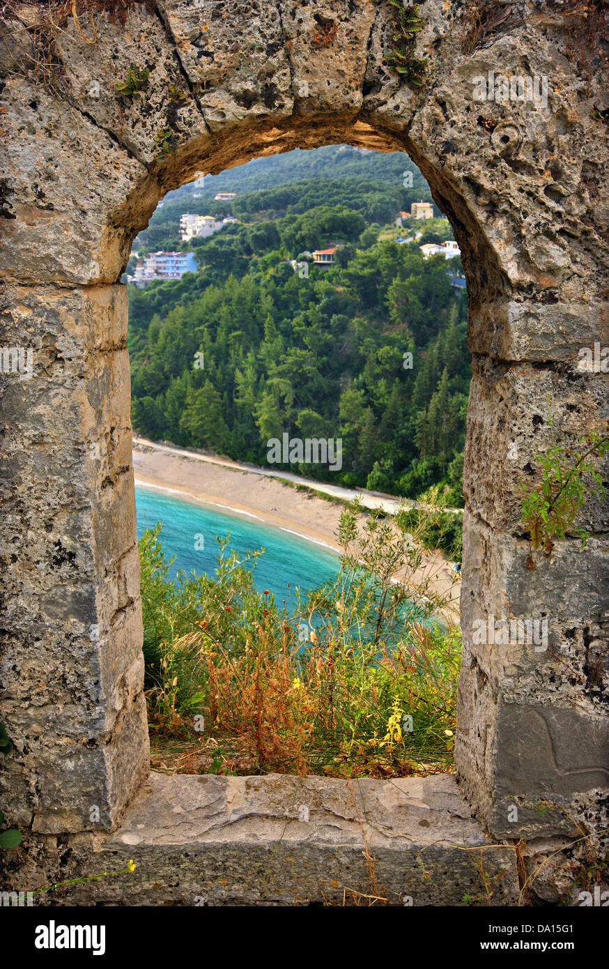 Valtos beach, seen 'through' the walls of the Venetian castle of Parga town, Preveza, Epirus, Greece. Stock Photo