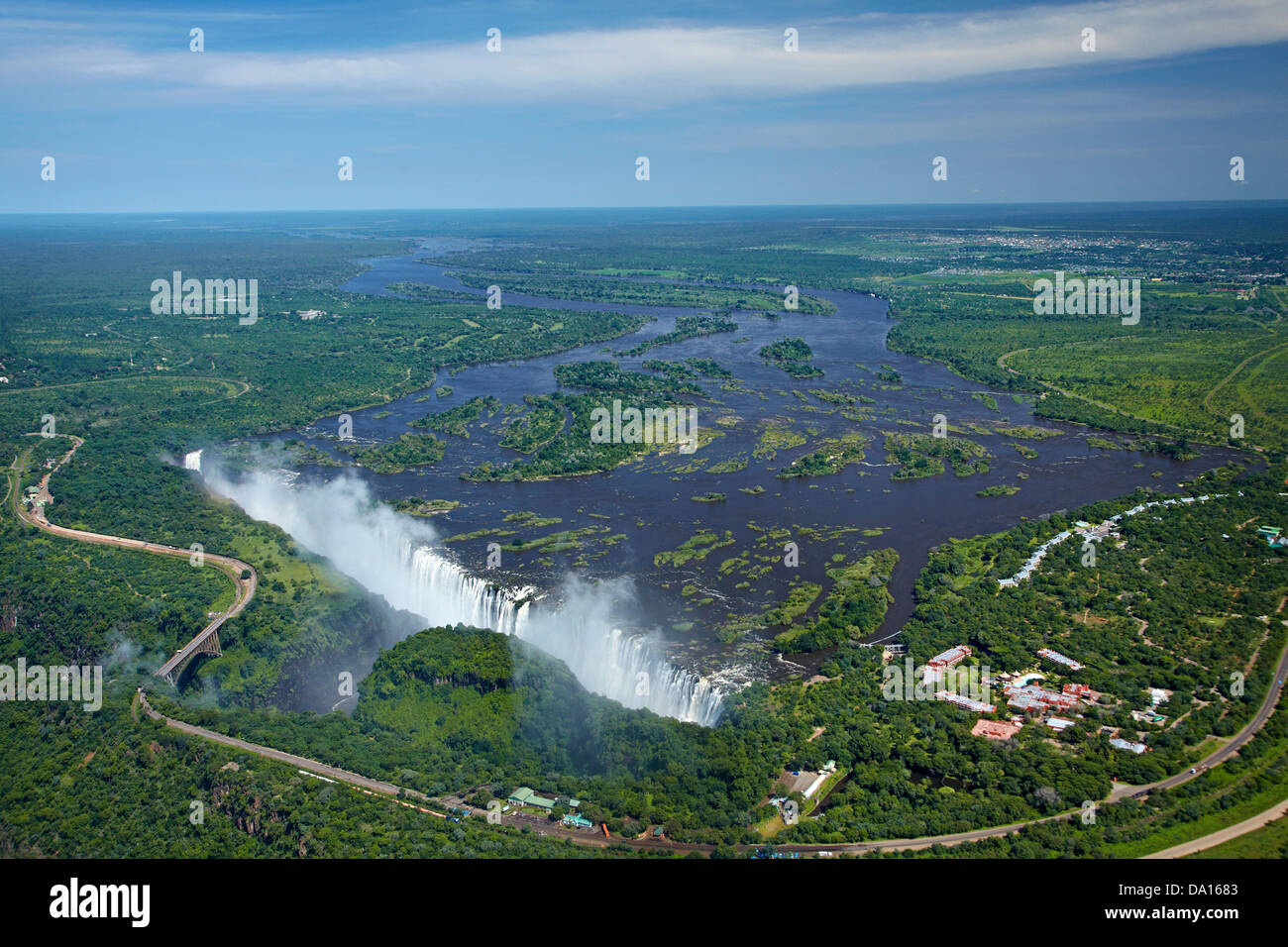 Victoria Falls or 'Mosi-oa-Tunya' (The Smoke that Thunders), Zambezi River, and Zambezi Sun Hotel (right), Zimbabwe / Zambia Stock Photo