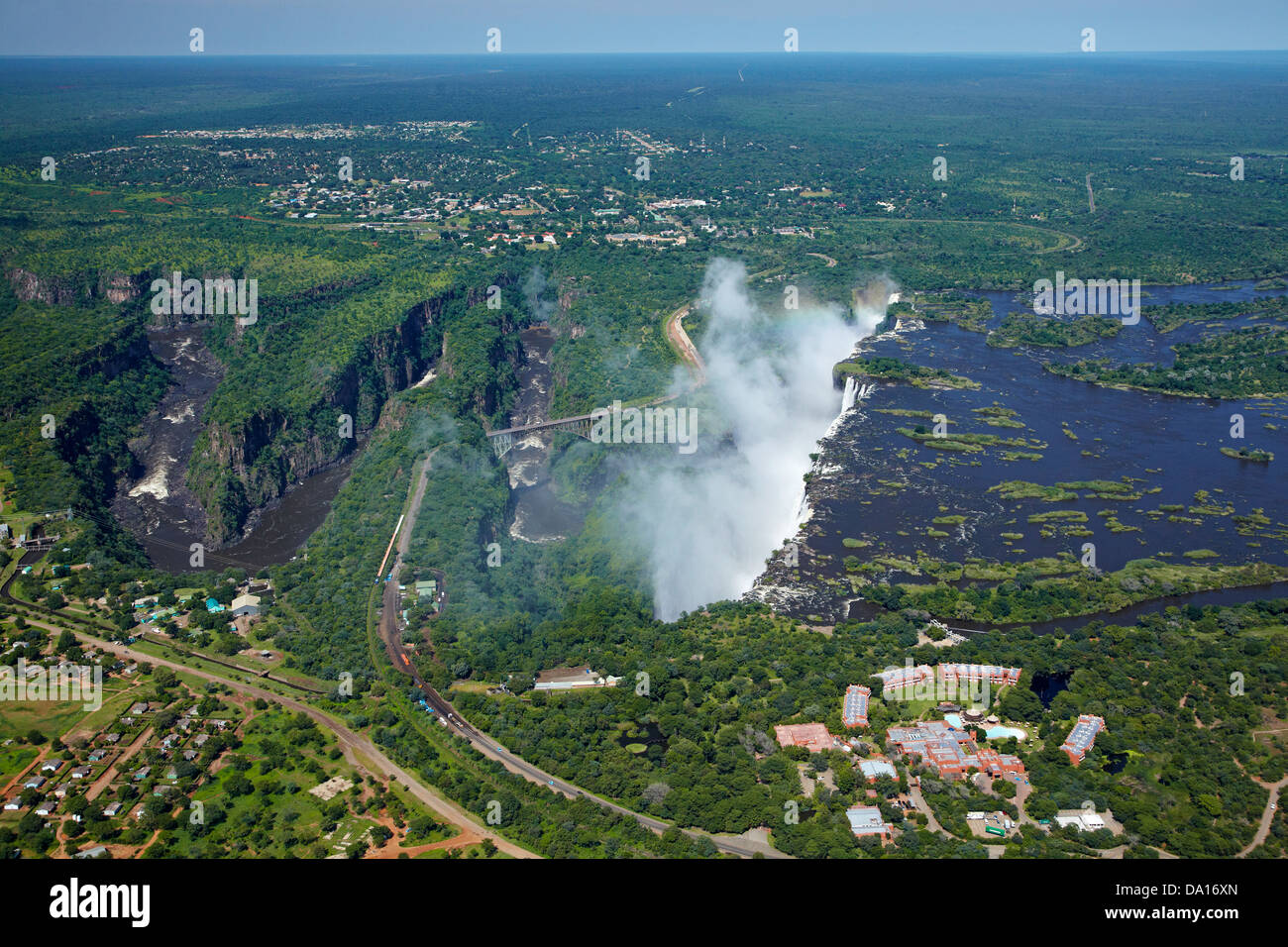 Victoria Falls or 'Mosi-oa-Tunya' (The Smoke that Thunders), Zambezi River, Batoka Gorge, and Zambezi Sun Hotel (right) Stock Photo