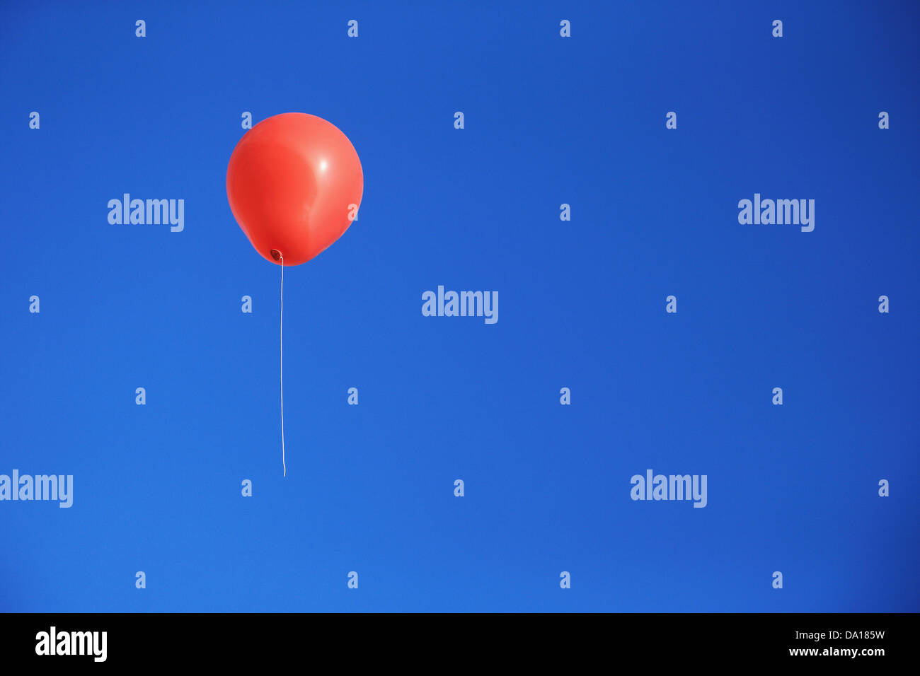 Balloon flying in the blue sky Stock Photo - Alamy