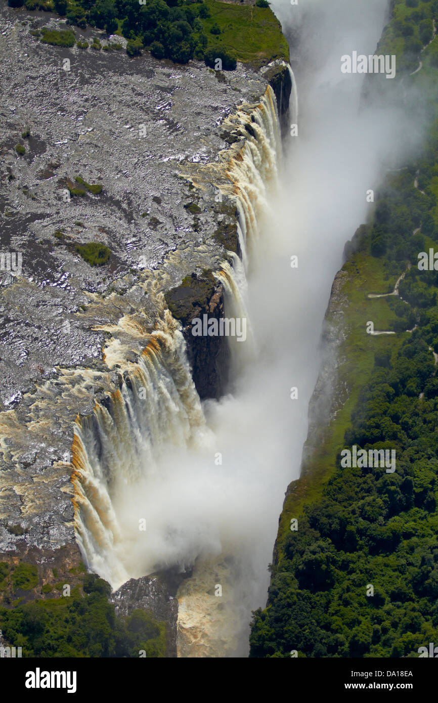 Victoria Falls or "Mosi-oa-Tunya" (The Smoke that Thunders), and Zambezi River, Zimbabwe / Zambia border, Southern Africa Stock Photo